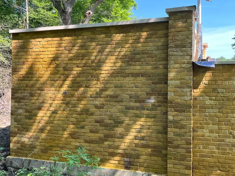 After — tinted and matched brickwork, Epping Forest