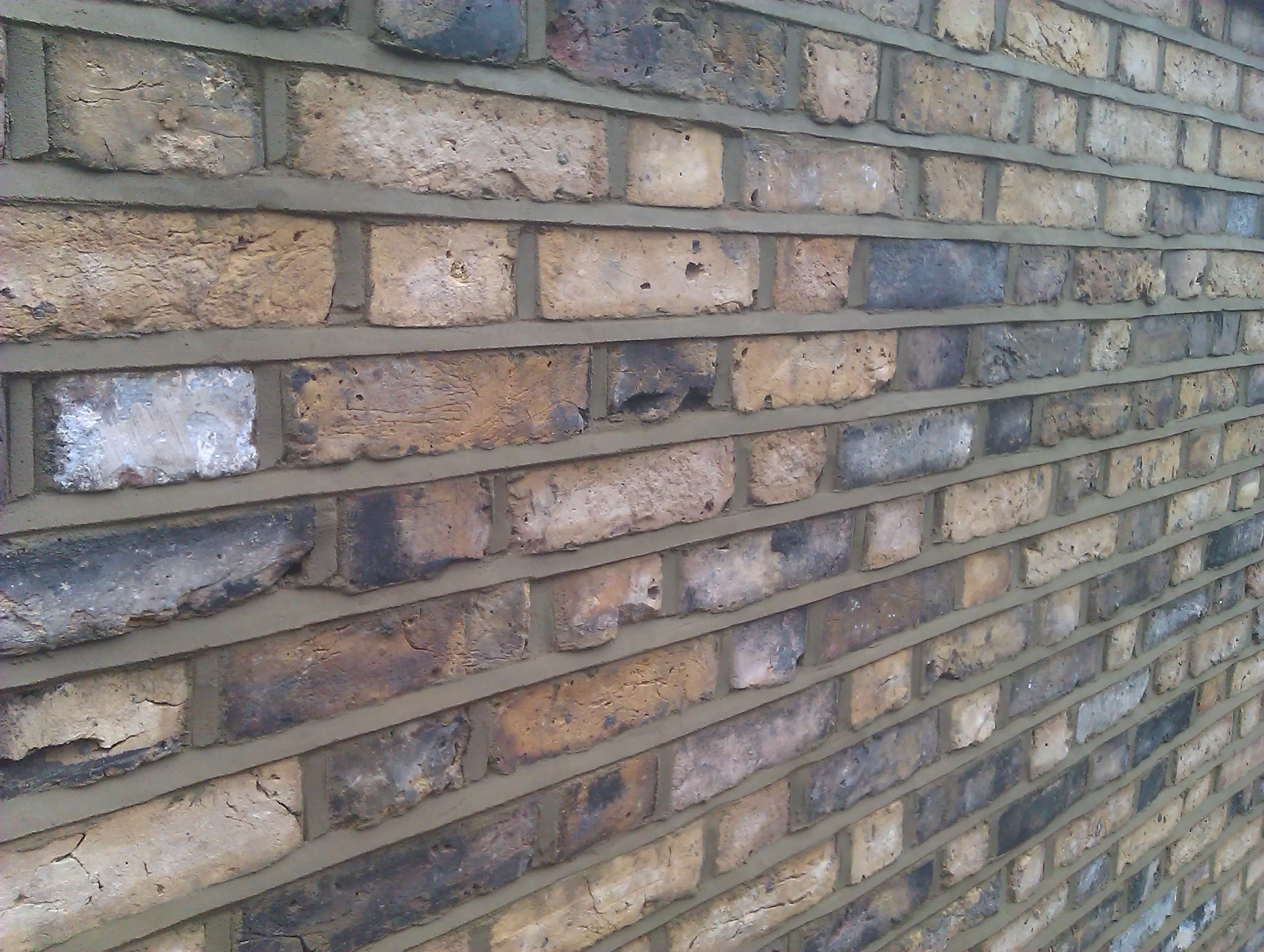 Weather-struck repointing on a Victorian terrace in Islington, North London